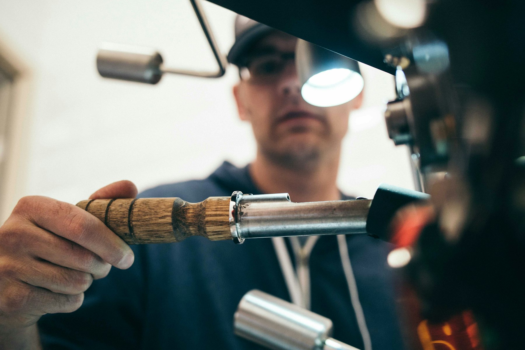 A tradesperson working by headlamp