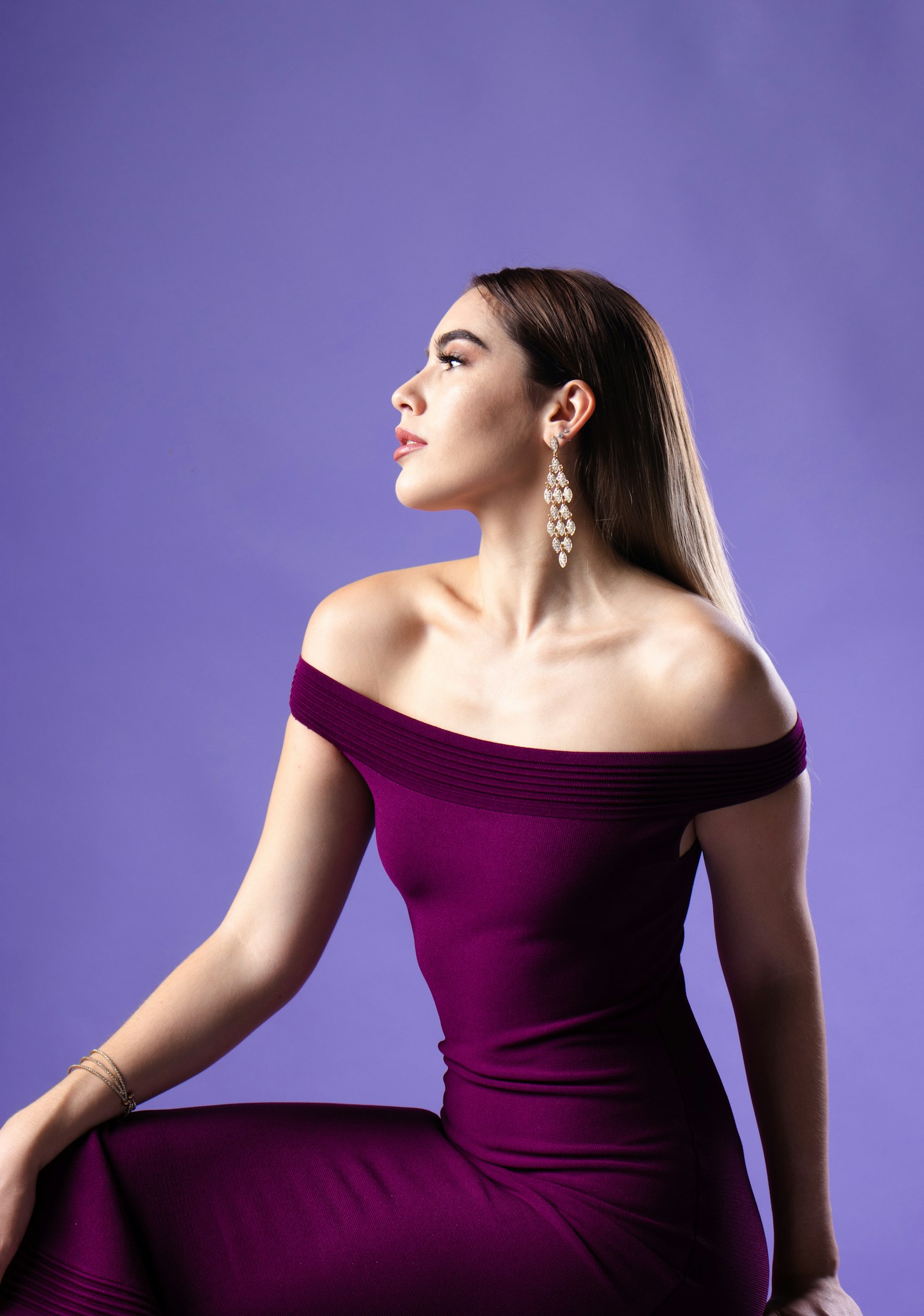 Plum silk gazar gown in profile