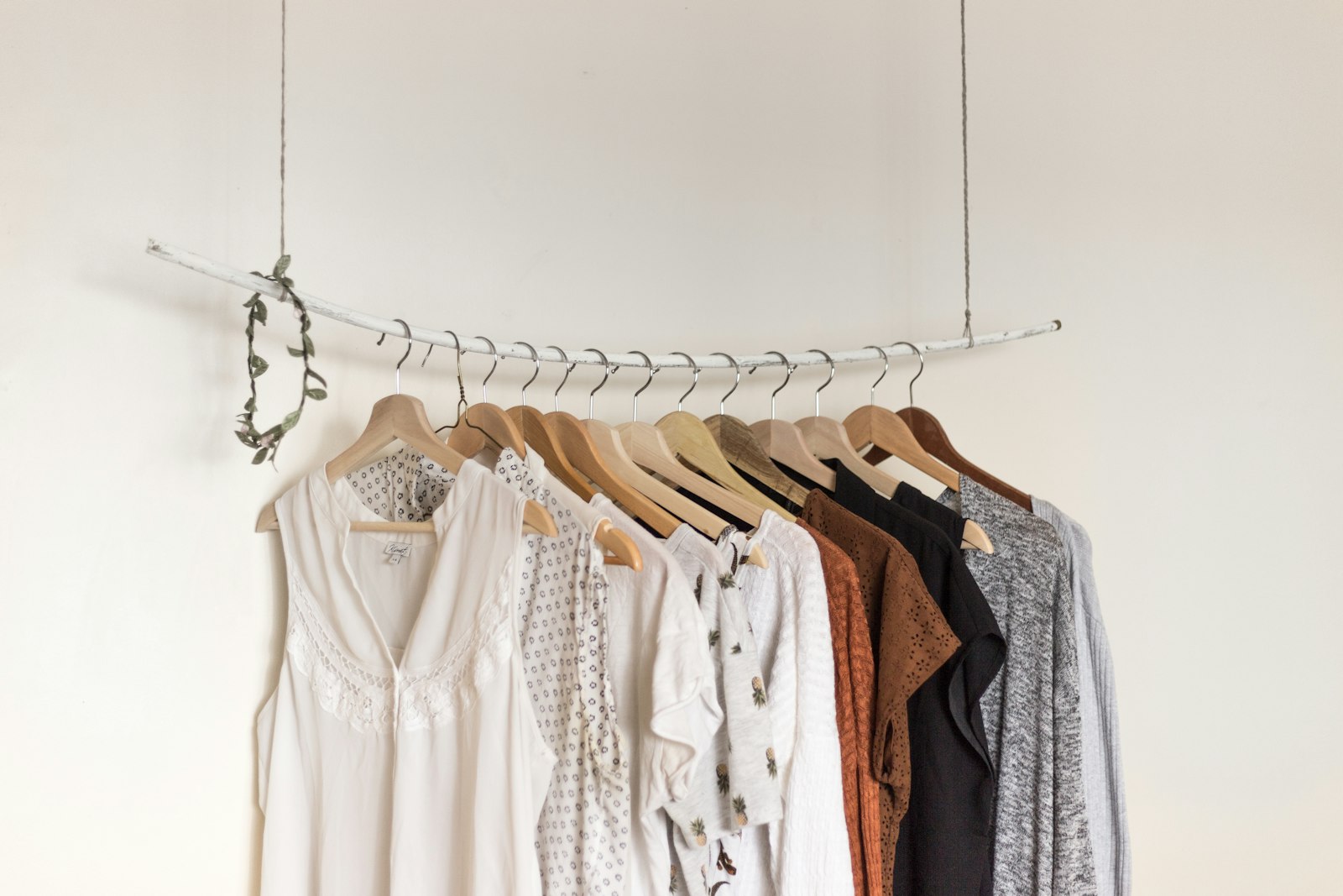 White garments hanging on a rail