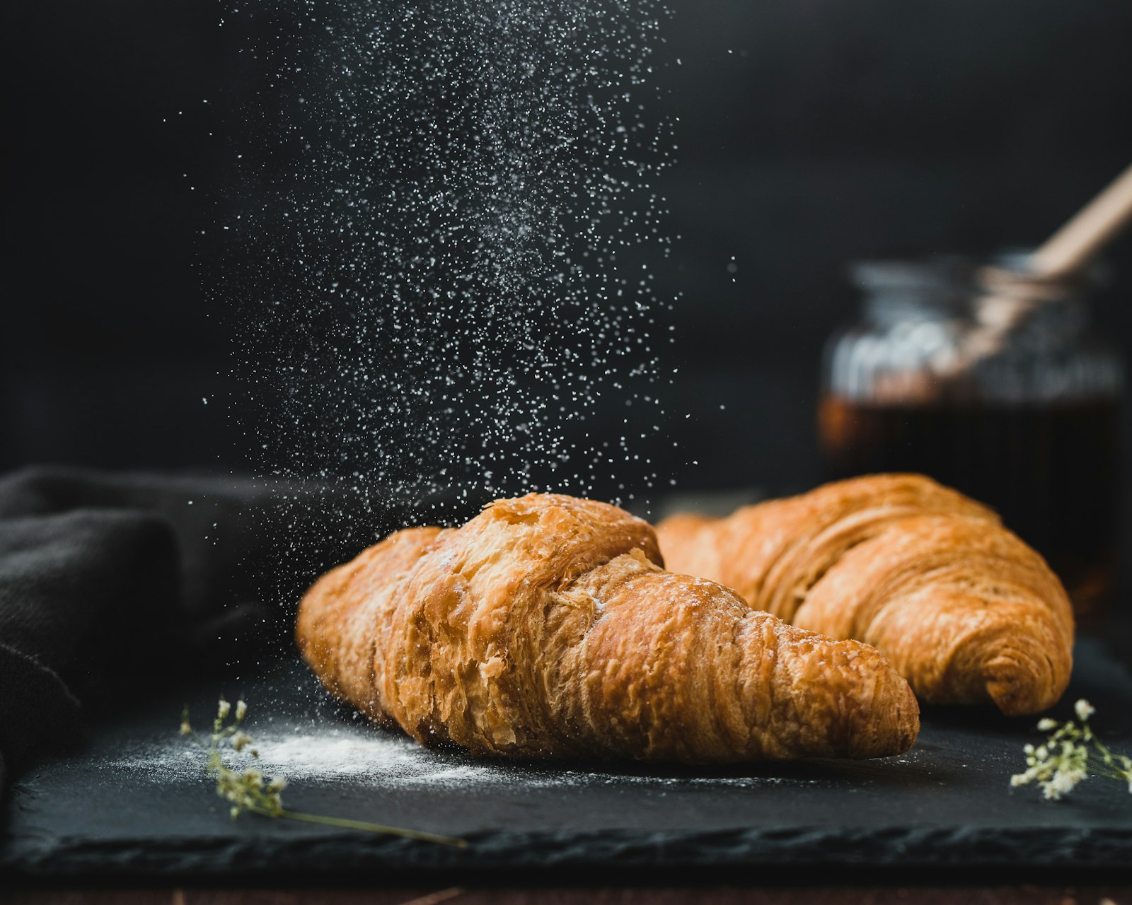 Butter croissant dusted with flour