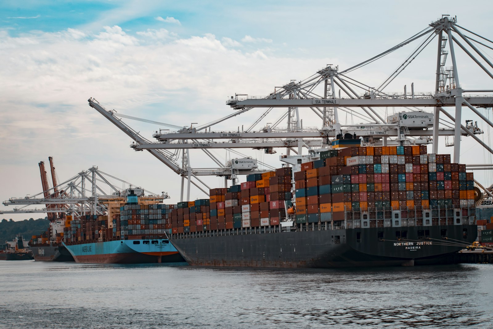 Port cranes loading container vessel