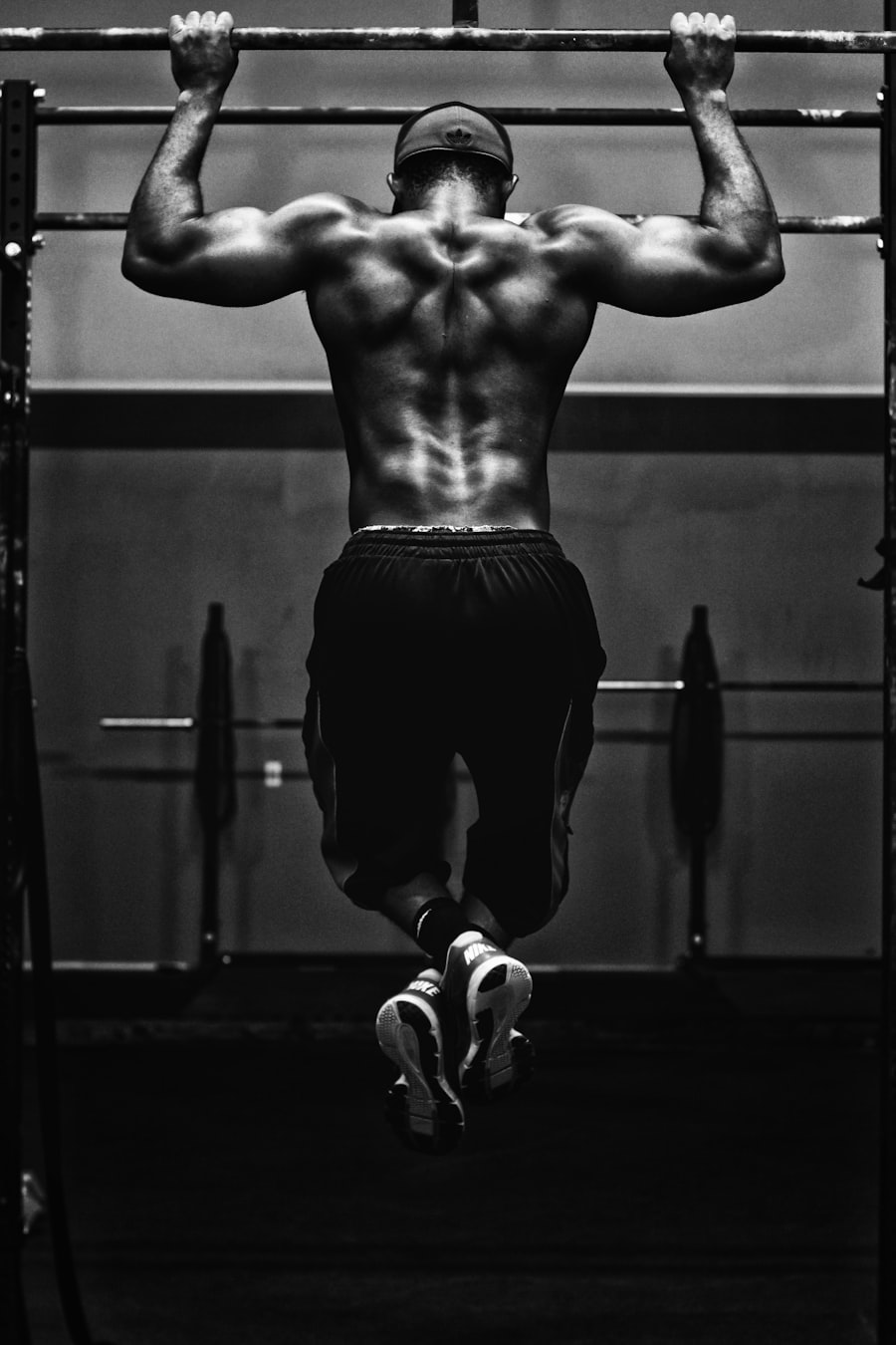 Coach Kofi Mensah on the bar